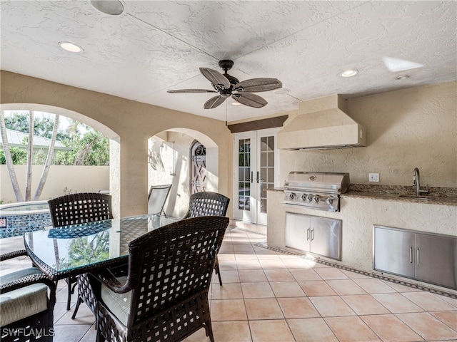 view of patio / terrace featuring sink, french doors, grilling area, exterior kitchen, and ceiling fan