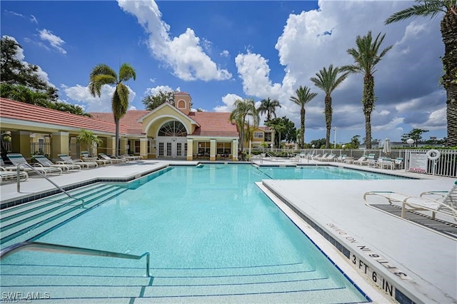 view of swimming pool featuring a patio