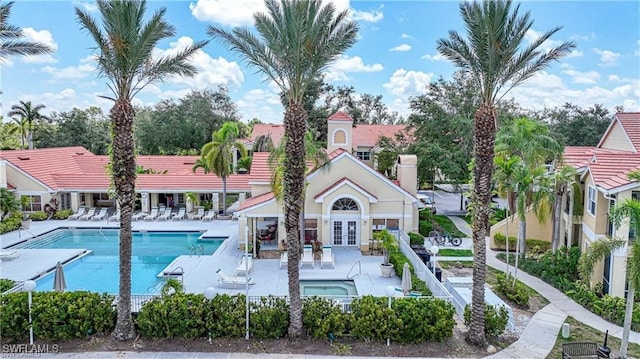 view of swimming pool with a patio