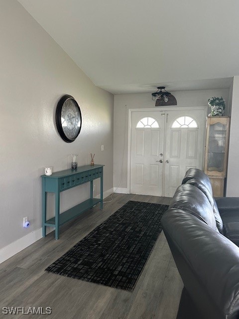 living room featuring dark hardwood / wood-style flooring