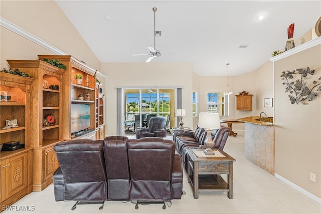 living room featuring light tile patterned flooring, lofted ceiling, and ceiling fan