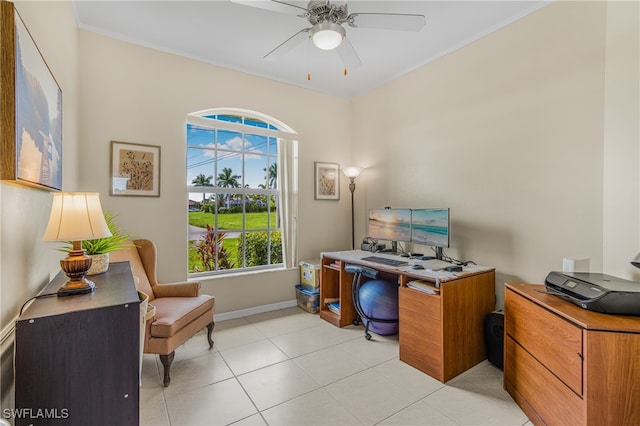 tiled home office featuring crown molding and ceiling fan