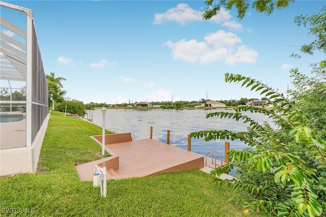 view of dock with a water view, a yard, and a lanai