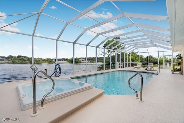 view of pool with a lanai, a water view, and a patio