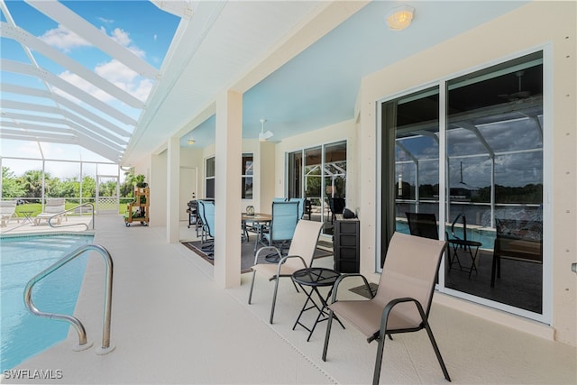 view of pool with a lanai and a patio area