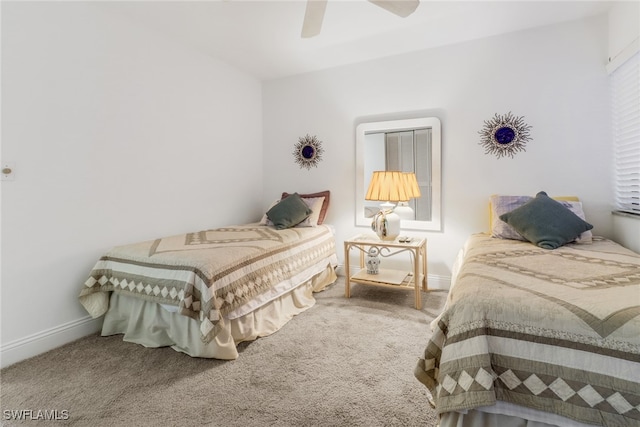 bedroom with ceiling fan and carpet