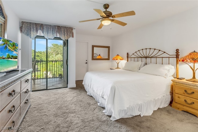 carpeted bedroom with ceiling fan and access to exterior