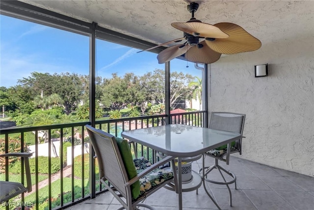 balcony featuring ceiling fan