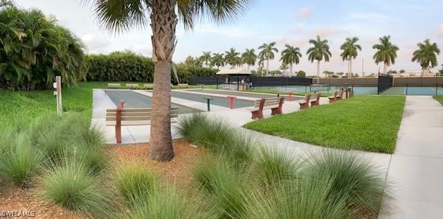 4600 Flagship Dr Unit 201, Fort Myers, FL 33919 - view of home's community with a yard
