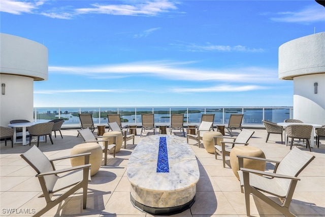 view of patio / terrace with a water view