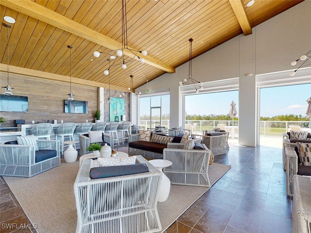 interior space with ceiling fan and outdoor lounge area