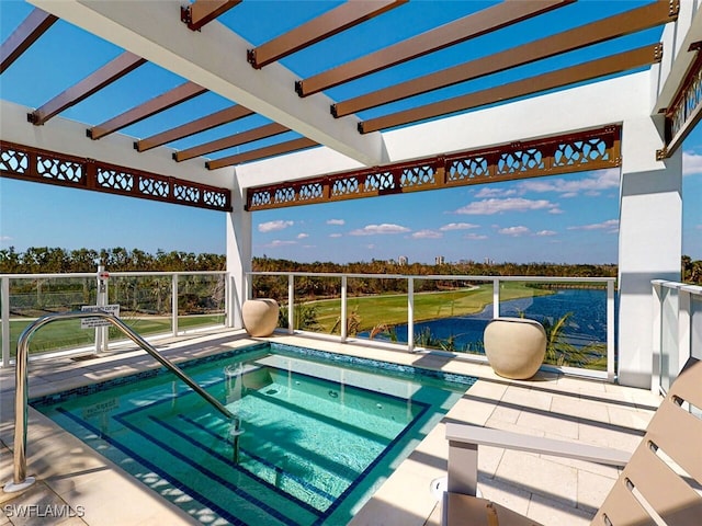 view of swimming pool featuring a pergola, a water view, and an in ground hot tub