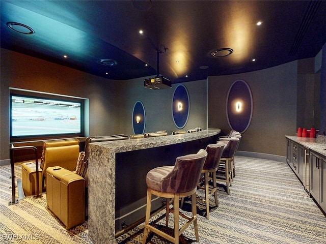 interior space featuring light stone counters and light colored carpet