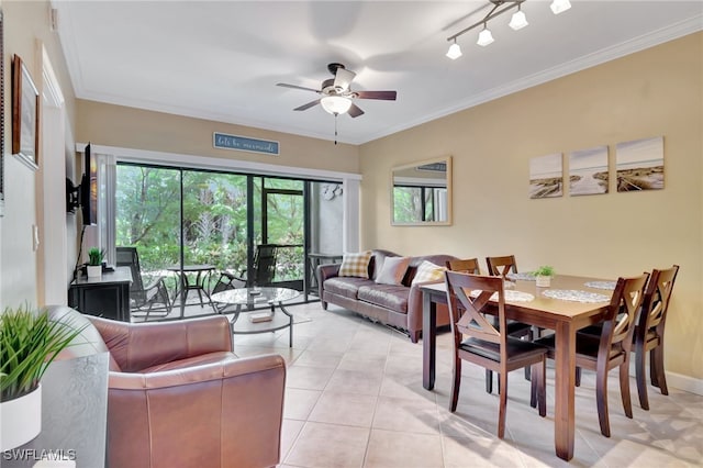 tiled living room with ceiling fan and crown molding