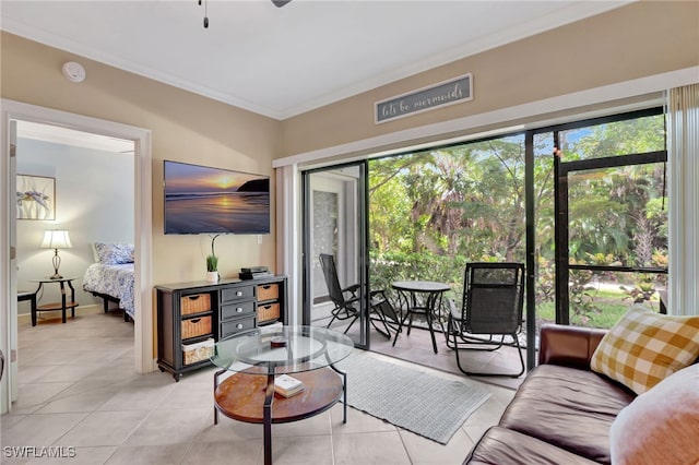 living room featuring light tile patterned floors and ornamental molding