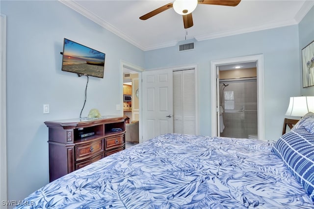 bedroom featuring ensuite bath, ceiling fan, a closet, and ornamental molding