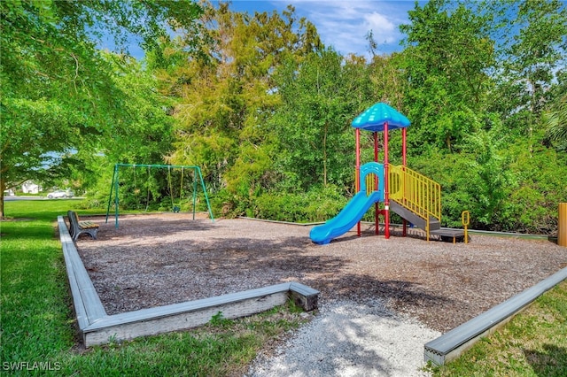 3323 Olympic Dr Unit 715, Naples, FL 34105 - community jungle gym with a lawn