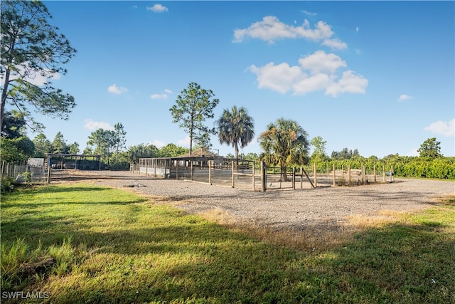 view of jungle gym featuring a rural view