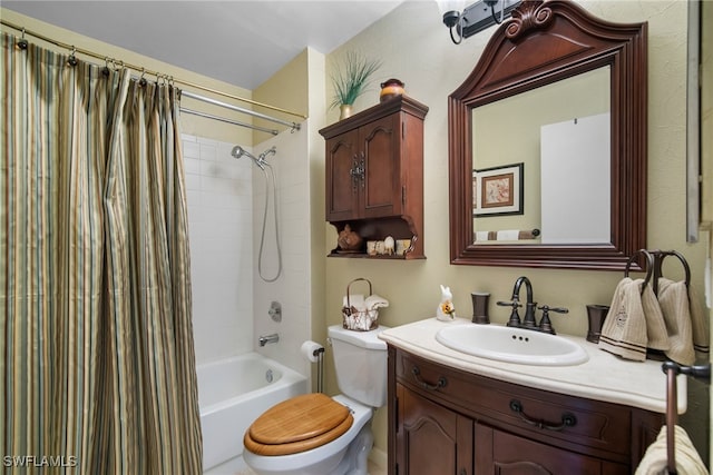 full bathroom with vanity, shower / bath combo with shower curtain, and toilet