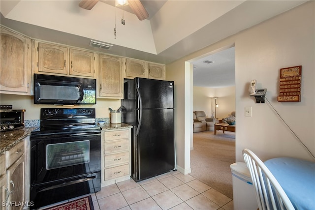 kitchen with black appliances, ceiling fan, dark stone counters, light brown cabinetry, and light tile patterned floors