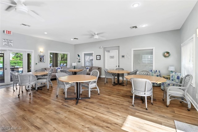 dining area featuring ceiling fan and light hardwood / wood-style floors