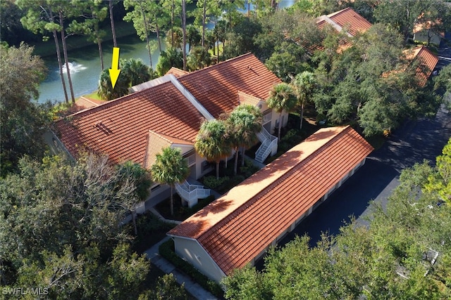 drone / aerial view with a water view