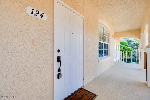 entrance to property with covered porch