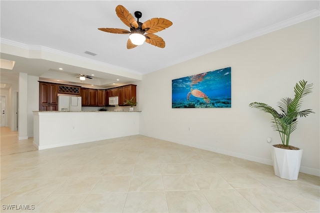 unfurnished living room featuring ceiling fan, light tile patterned floors, and ornamental molding