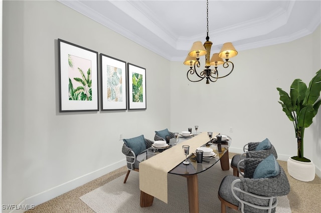 home office featuring ornamental molding, carpet floors, a chandelier, and a tray ceiling