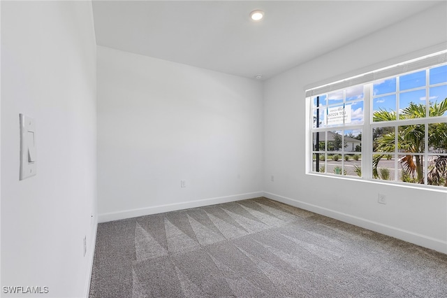 view of carpeted spare room