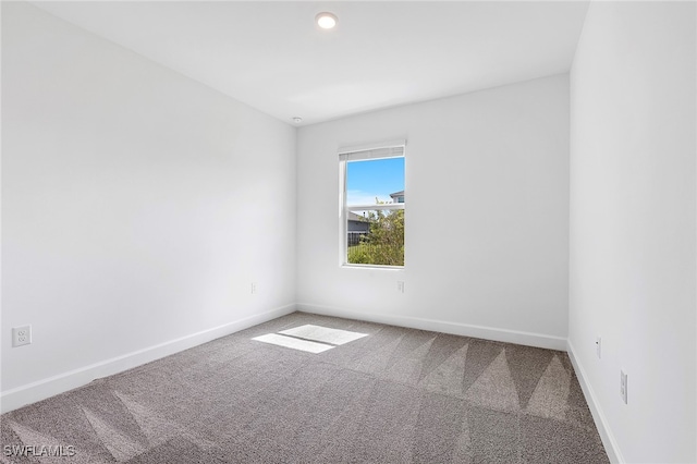 view of carpeted spare room