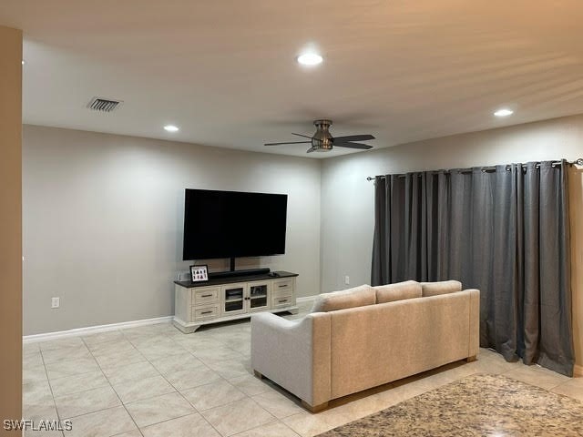 living room featuring ceiling fan