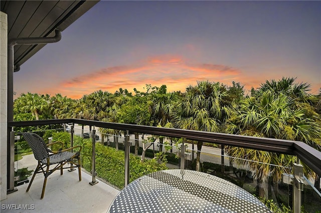 view of balcony at dusk