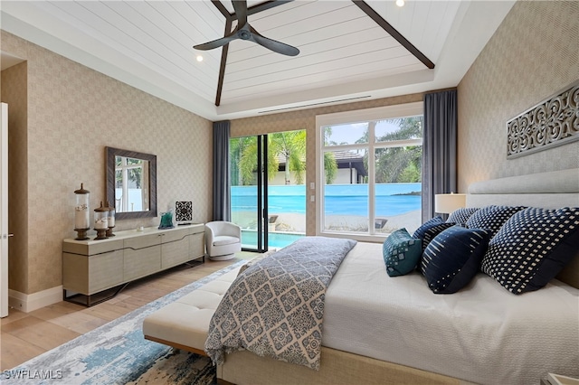 bedroom featuring access to outside, light hardwood / wood-style flooring, ceiling fan, and wood ceiling