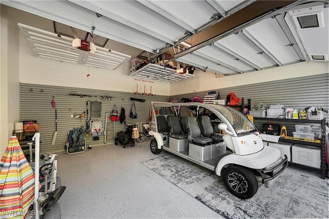 garage featuring a garage door opener