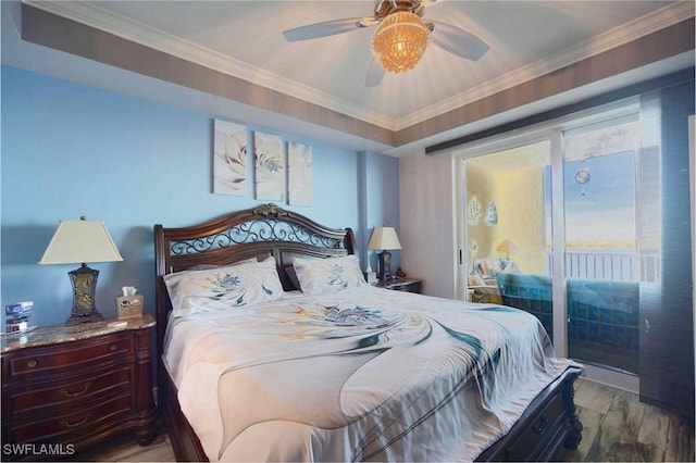 bedroom featuring ornamental molding, hardwood / wood-style floors, and ceiling fan