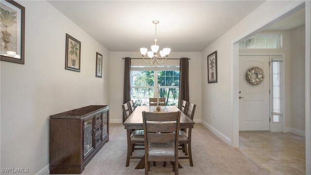 dining area with a chandelier