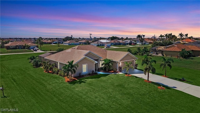 birds eye view of property with a residential view