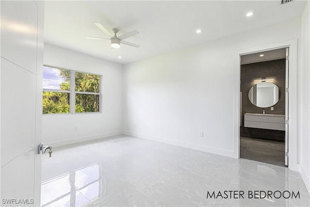 spare room featuring ceiling fan