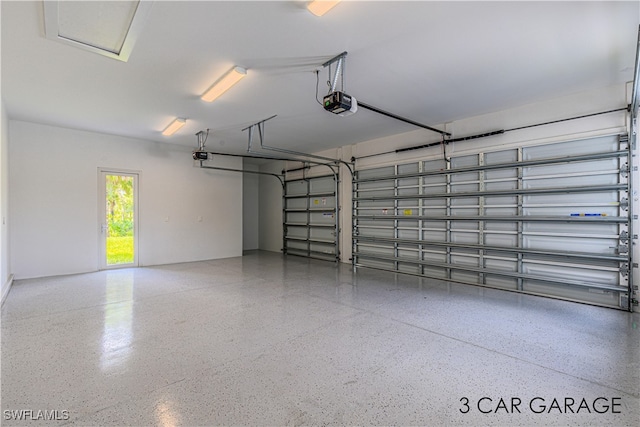 garage featuring a garage door opener