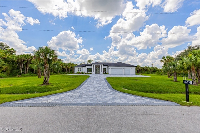 ranch-style home featuring a front yard