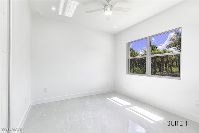 spare room featuring ceiling fan