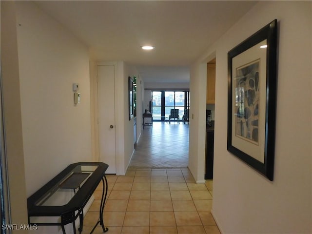 hallway with light tile patterned flooring