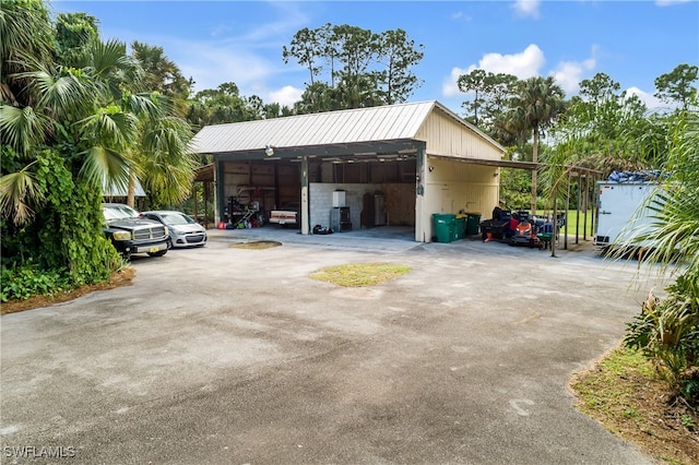 exterior space with a carport