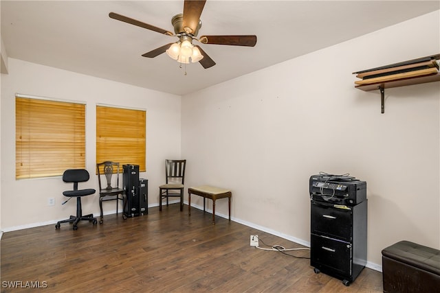 miscellaneous room featuring ceiling fan and dark hardwood / wood-style flooring