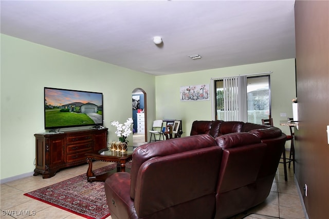 living room featuring light tile patterned floors