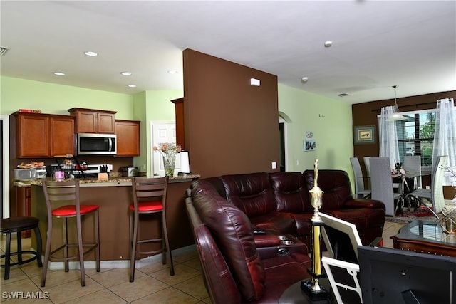 living room featuring light tile patterned floors