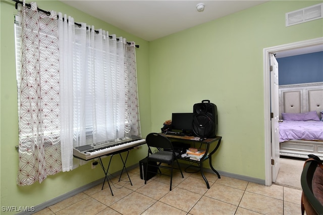 office space featuring light tile patterned flooring