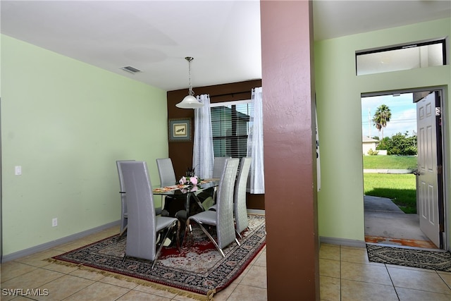 dining space with light tile patterned floors