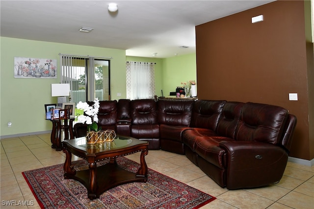 living room with light tile patterned flooring